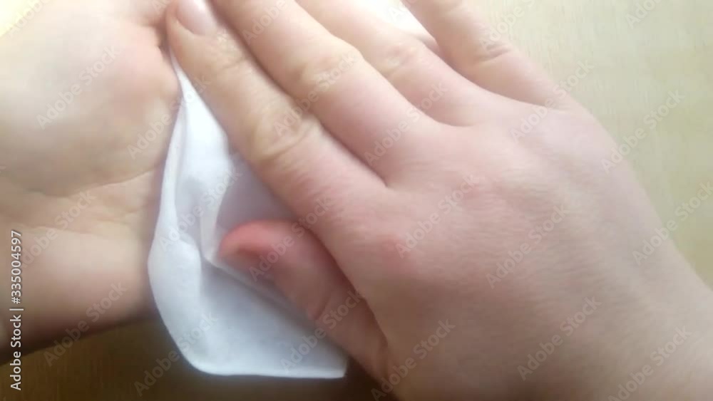 wiping your hands with a wet antibacterial wipe, World Hand Hygiene Day, hand sanitizer. wiping your hands with a wet antibacterial wipe, World Hand Hygiene Day, hand sanitizer.