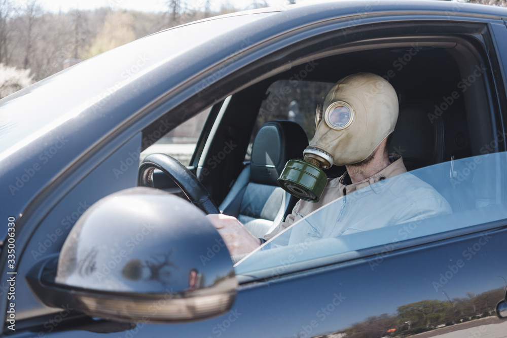 Man in a gas mask, quarantine coronavirus