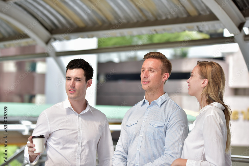 A group of young people talking about exchanging business information Business concept A group of young people talking about exchanging business information Business concept