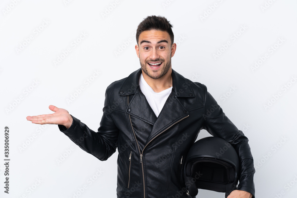 Man with a motorcycle helmet with shocked facial expression Man with a motorcycle helmet with shocked facial expression