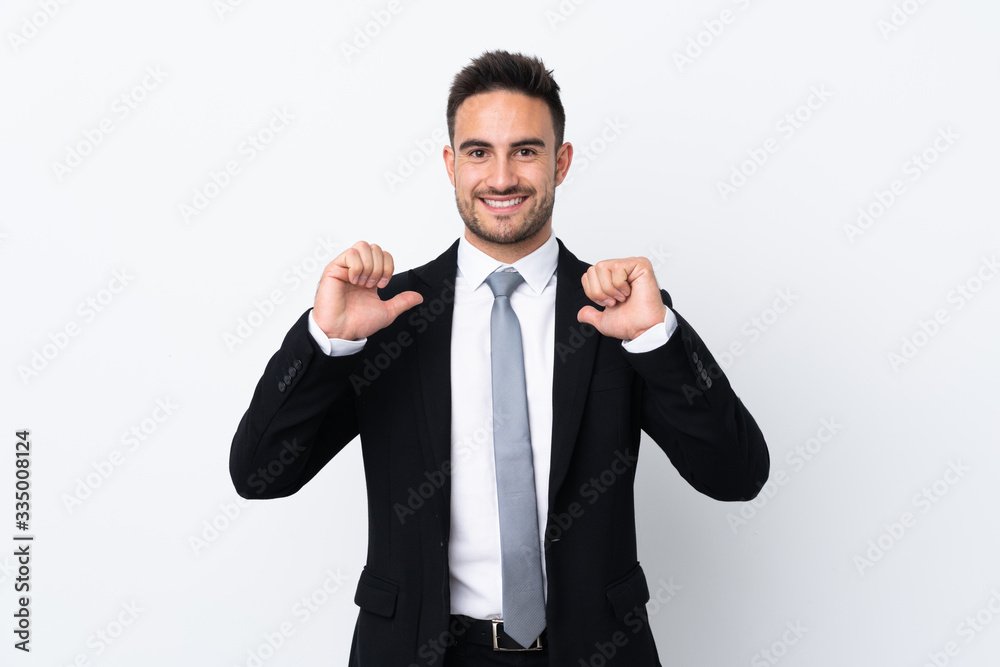 Young business man over isolated background proud and self-satisfied Young business man over isolated background proud and self-satisfied