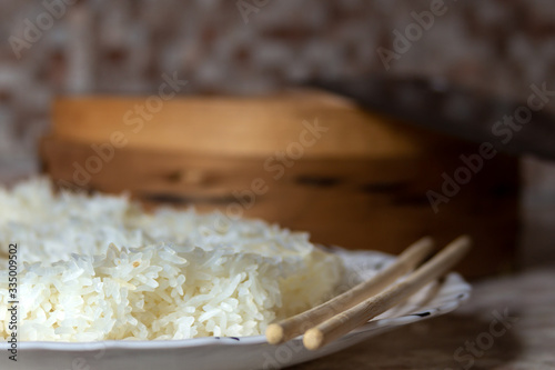 Rice cooked in a traditional wooden steamer has a special taste. You can eat it as a separate dish, as a side dish, or as an addition or ingredient to other dishes. My favourite is jasmine rice.