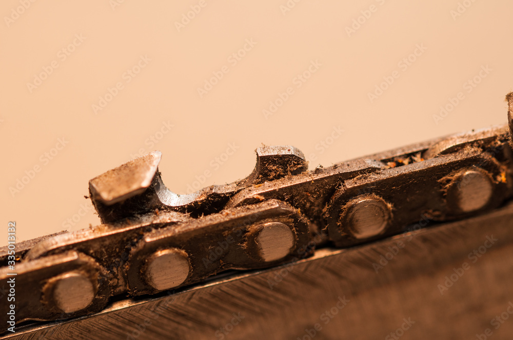 Old chainsaw in workshop. Defective chainsaw on service Old chainsaw in workshop. Defective chainsaw on service