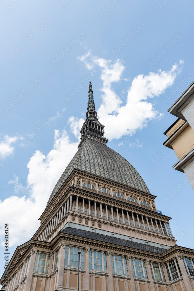 details of the Mole Antonelliana towering on the city di Torino
