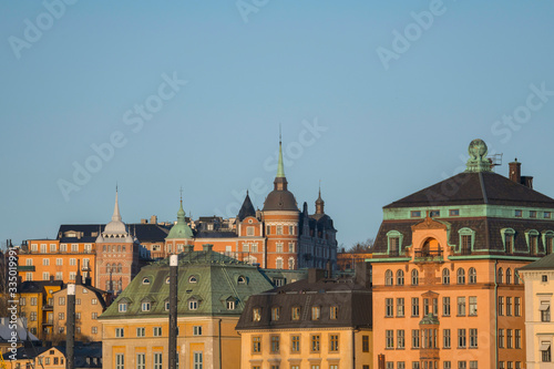 Houses of the old town district Gamla Stan an Södermalm in Stockholm a sunny spring morning. © Hans Baath