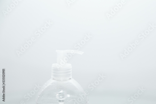 Antibacterial transparent hand sanitizer gel in a plastic bottle. Coronavirus (Covid-19) preventive measures top view concept