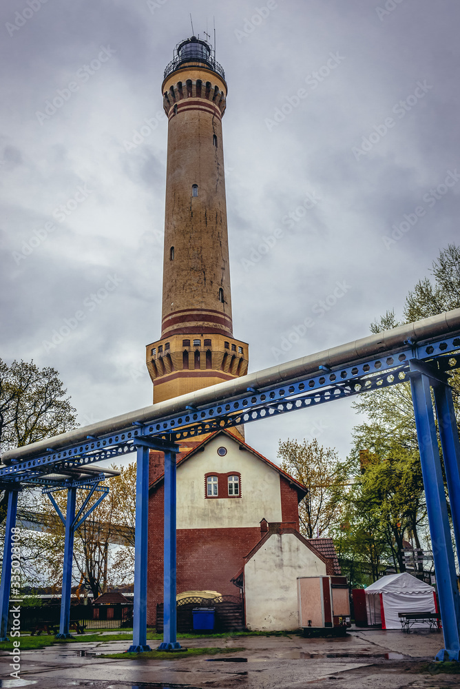 Fototapeta premium Baltic Sea lighthouse in Swinoujscie coastal town, Poland