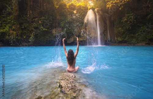 Girl at Kawasan Falls Waterfall - Cebu, Philippines photo