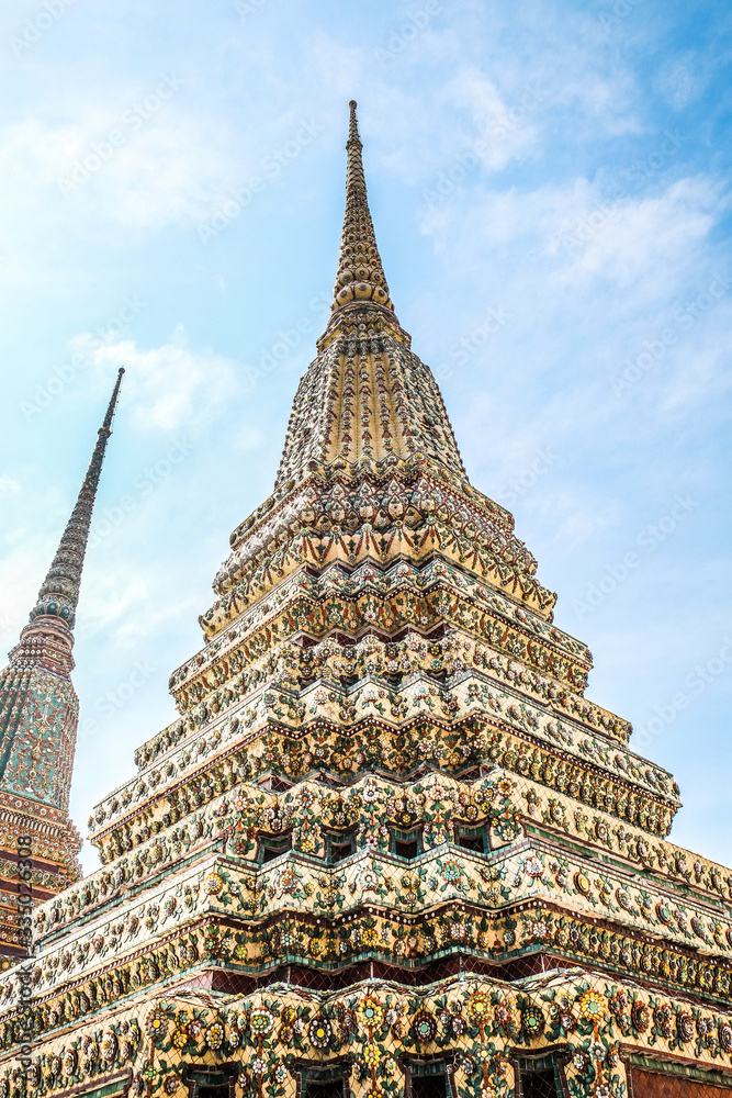 Fototapeta premium Thai pagoda with sky background at Wat Pho Bangkok, Thailand
