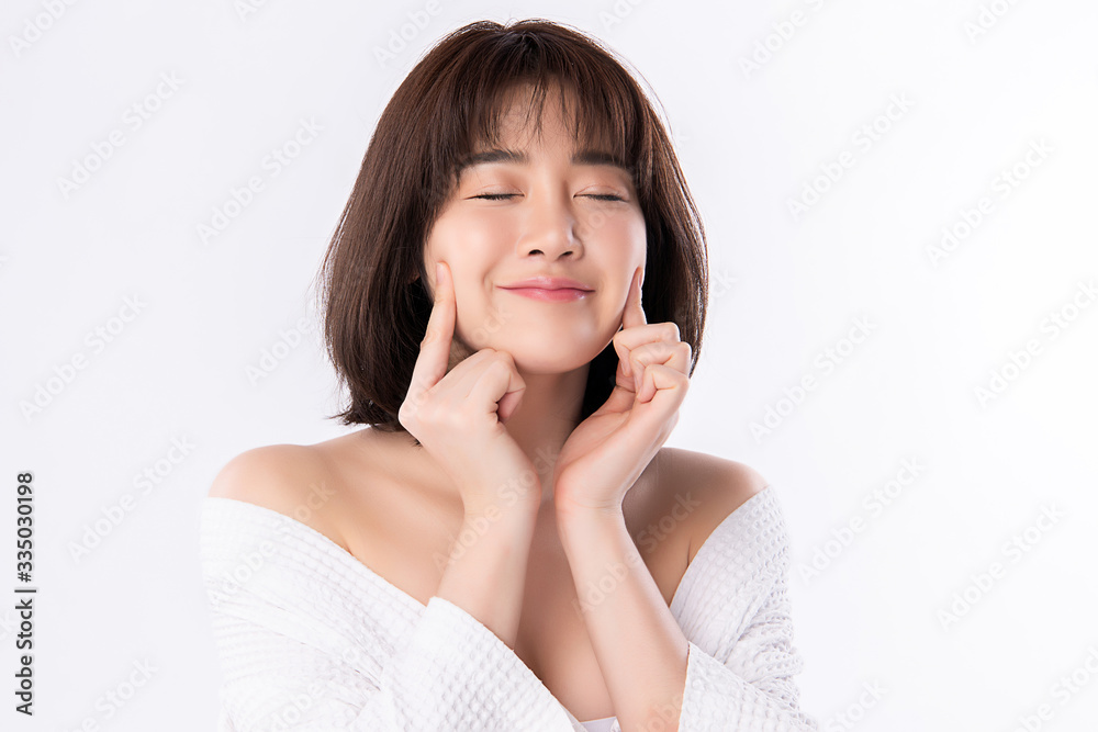 Beautiful Young Asian Woman with Clean Fresh Skin. Face care, Facial treatment, Cosmetology, beauty and healthy skin and cosmetic concept, woman beauty skin isolated on white background Beautiful Young Asian Woman with Clean Fresh Skin. Face care, Facial treatment, Cosmetology, beauty and healthy skin and cosmetic concept, woman beauty skin isolated on white background