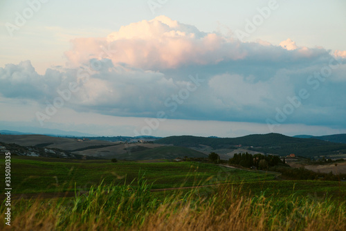 Landscape in Tuscany at sunset in summer - Tuscany, Italy, Europe