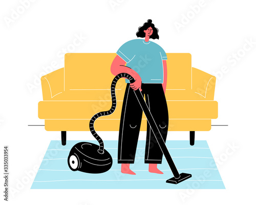 Woman vacuuming floor at home. Everyday activity. Social distancing and self-isolation. Stay safe.