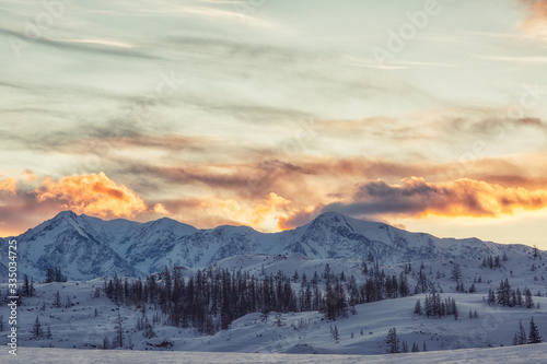 Beautiful winter landscape with mountains at sunset. Altai. Russia © Shchipkova Elena