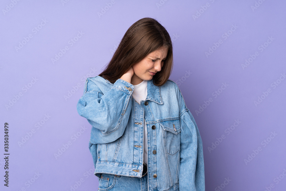 Teenager caucasian girl isolated on purple background with neckache Teenager caucasian girl isolated on purple background with neckache