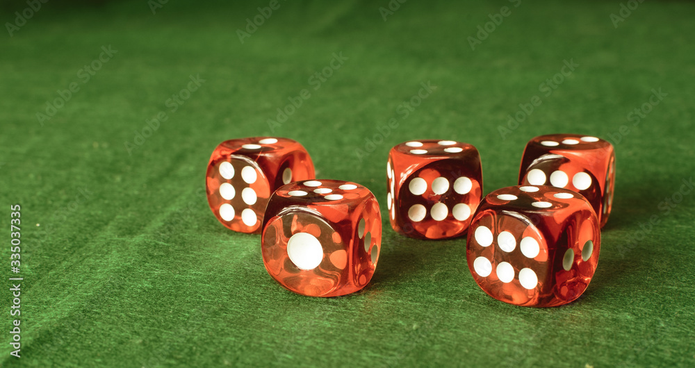 dice on green table dice on green table