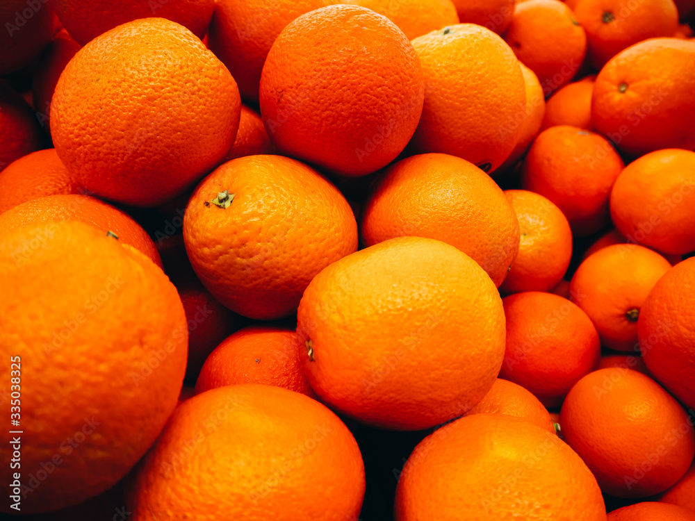 Many ripe oranges photographed in a supermarket. Many ripe oranges photographed in a supermarket.