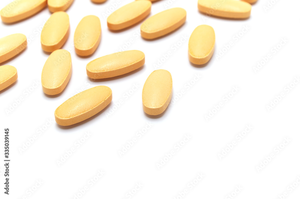 Group of Vitamin C pills on white background and Copy space. For protection Coronavirus (Covid-19) disease. Group of Vitamin C pills on white background and Copy space. For protection Coronavirus (Covid-19) disease.