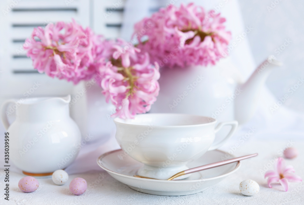 Fresh beautiful bouquet of pink hyacinths and a cup of coffee - breakfast for Mother's Day, Easter Fresh beautiful bouquet of pink hyacinths and a cup of coffee - breakfast for Mother's Day, Easter