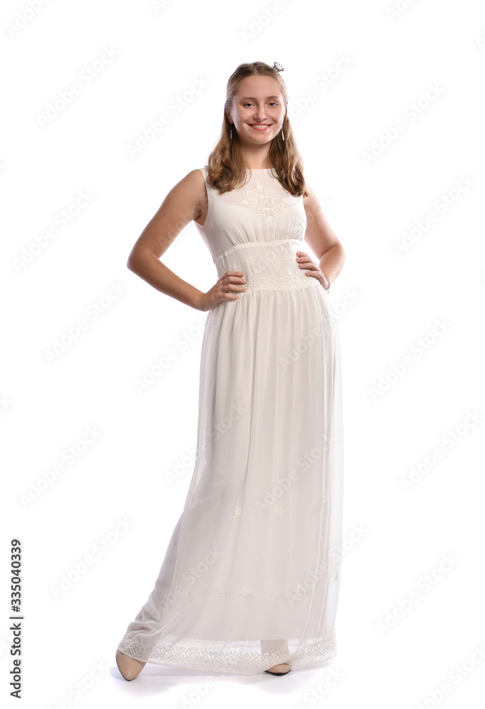 Beautiful blonde teen girl in white dress