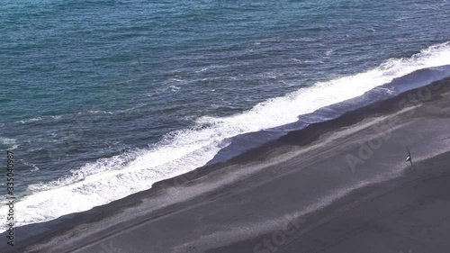 Iceland, Northwest Coast, Huna Fjord, Black Sand Beach View, overcast autumn day photo