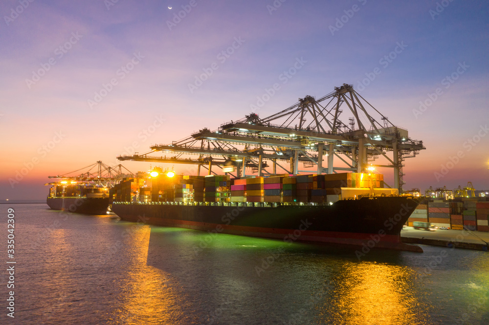 Container , container ship in export and import business and logistics. Shipping cargo to harbor by crane. Water transport International. Aerial view and top view. Container , container ship in export and import business and logistics. Shipping cargo to harbor by crane. Water transport International. Aerial view and top view.