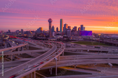 Dallas skyline with orange sky and major highways