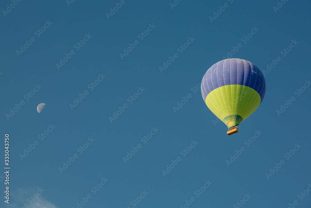 Fototapeta premium Flying balloons over amazing rock forms in Cappadocia