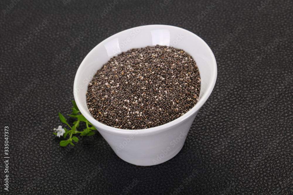 Dietary Chia seeds in the bowl Dietary Chia seeds in the bowl