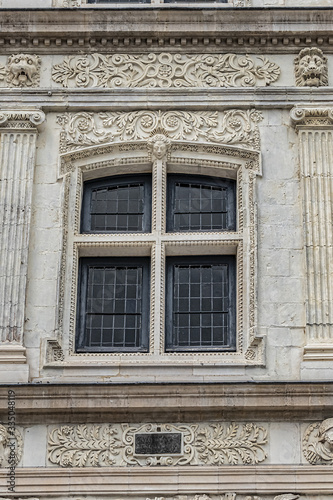 White stone Sagittarius House (Maison du Sagittaire) from and of XVI century at Jules Bocquet square in Amiens. Picardy, Somme, France.