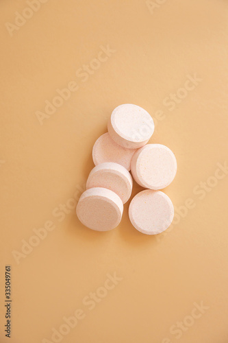 pills on beige background