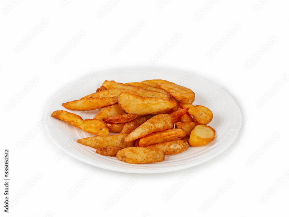 Golden fried rustic potato on a white plate side view Golden fried rustic potato on a white plate side view