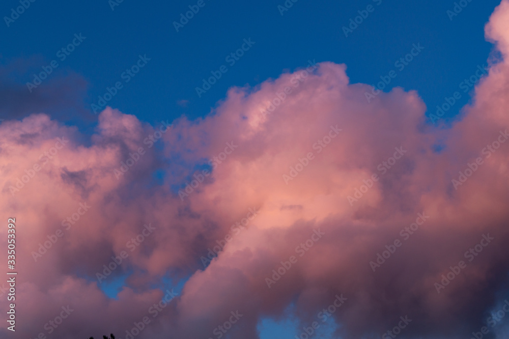 Fototapeta premium Clouds with sunset light and blue sky