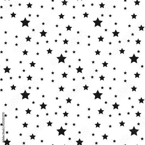 Seamless pattern with black stars on a white background. Vector illustration.