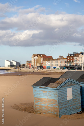 blue beach huts on Margate beach photo