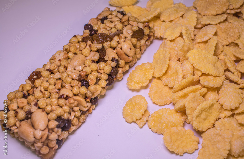 Granola bar, with nuts and flakes, healthy food, photographed from above Granola bar, with nuts and flakes, healthy food, photographed from above