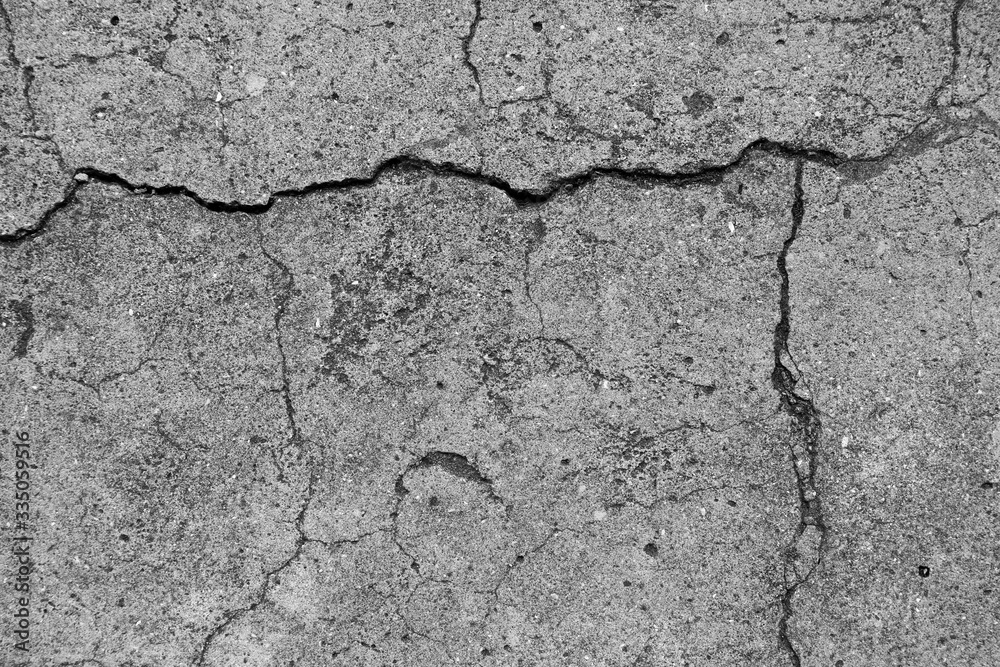 Grey cracked concrete Grey cracked concrete