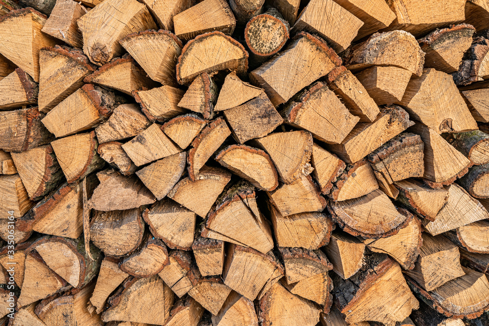Firewood texture. Pile of dry chopped fire wood background Firewood texture. Pile of dry chopped fire wood background