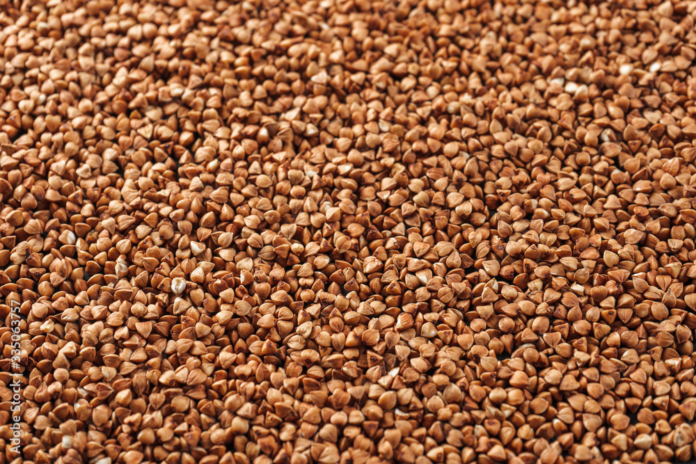 Background of buckwheat, close-up, perspective. Background of buckwheat, close-up, perspective.
