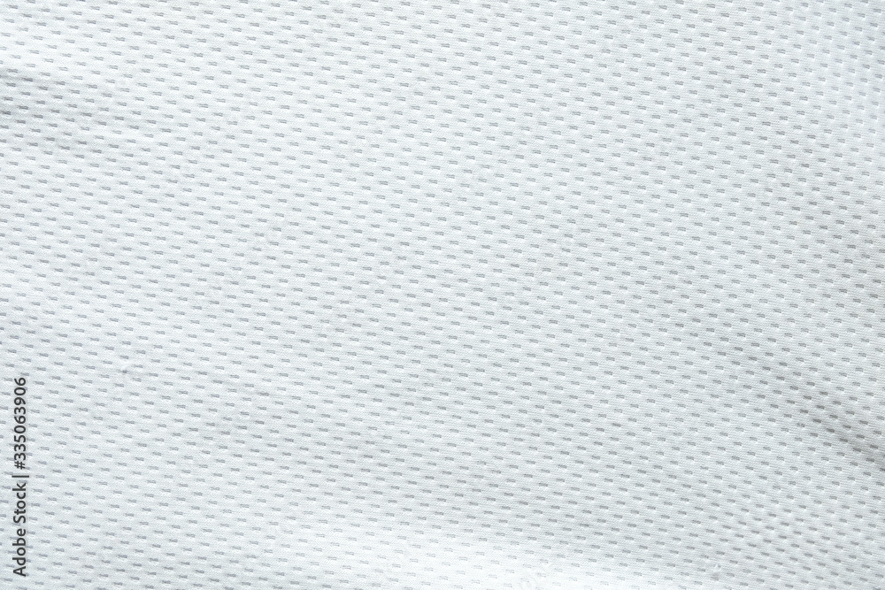 Selective focus, White mesh fabric background. cloth sport wear texture for exercise. light weight, good air flow, cool and easy to dry from sweat. abstract wallpaper with copy space for text. Selective focus, White mesh fabric background. cloth sport wear texture for exercise. light weight, good air flow, cool and easy to dry from sweat. abstract wallpaper with copy space for text.