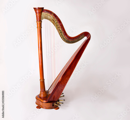 Valokuva Harp isolated on white background silhouette shellak wooden mucical instrument