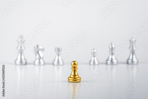 golden pawn chess standing encounter enemies. - leadership concept.