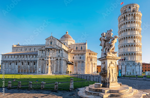 Fotótapéta Pisa, Piazza dei miracoli, with the Basilica and the leaning tower with copy space