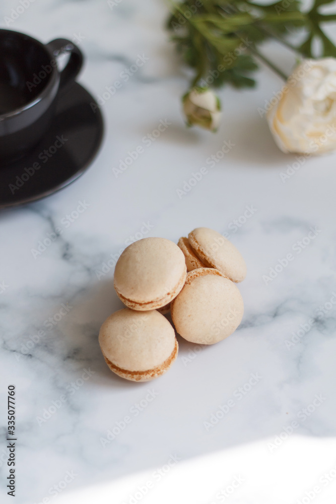 Close-up of macaroon on a light background. French dessert Close-up of macaroon on a light background. French dessert