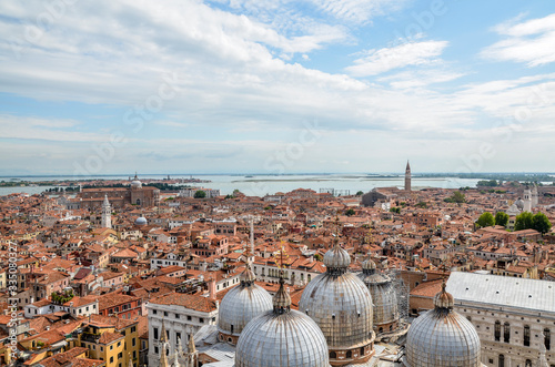 Cityscape of old Venice with domes and roof of  St Mark's Basilica and Doge's Palace from St Mark's Campanile bell tower, Venice, Italy photo