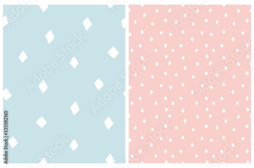 Geometric Seamless Vector Pattern with Off-White Spots Isolated on a Pastel Blue and Light Blush Pink Background. Simple Lovely Confetti Rain. Cute Diamond Vector Epeatable Design.