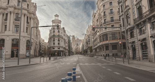 MADRID, SPAIN - 2 APRIL 2020: The city center "La gran vía" of Madrid (Spain) remains completely empty during the quarantine decreed to combat the covid-19 crisis. Coronavirus pandemic in Europe.