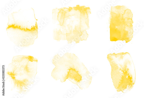 Set of yellow paint splashes isolated. Vector watercolor brushes