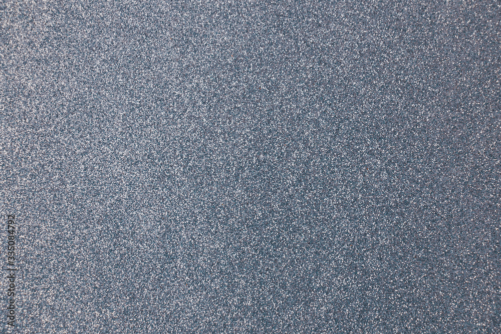 texture of shiny silver paper with a blue tint texture of shiny silver paper with a blue tint