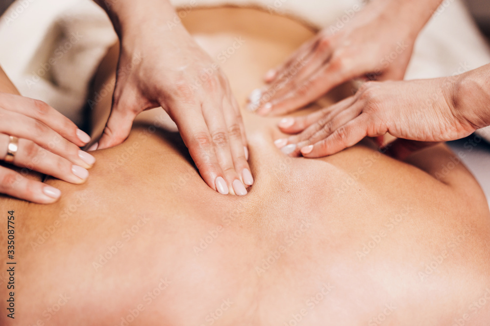 Four hands effective massage - double back massage Four hands effective massage - double back massage