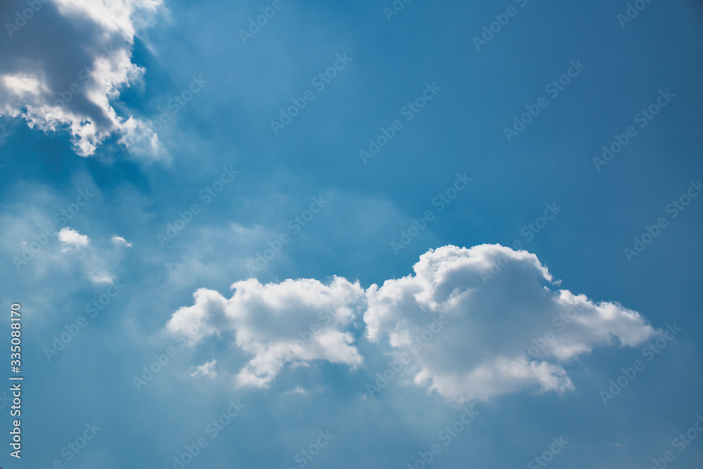 Beautiful blue sky with with light puffy cirrus clouds background textures Beautiful blue sky with with light puffy cirrus clouds background textures